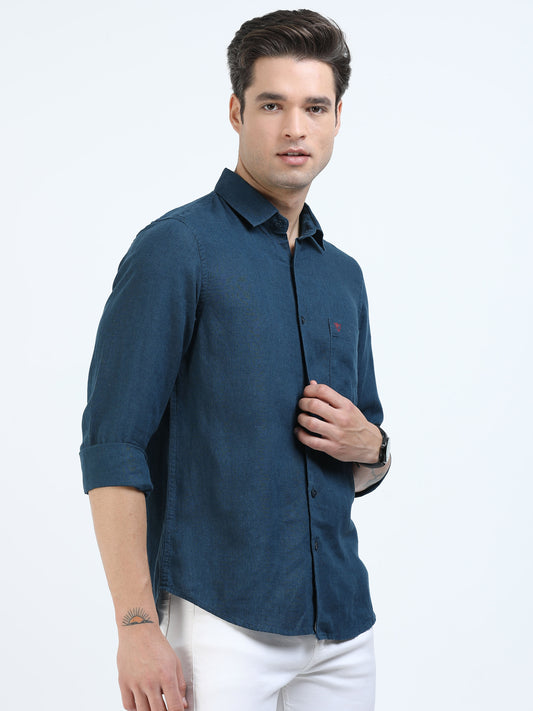 Man wearing a blue shirt on a white background